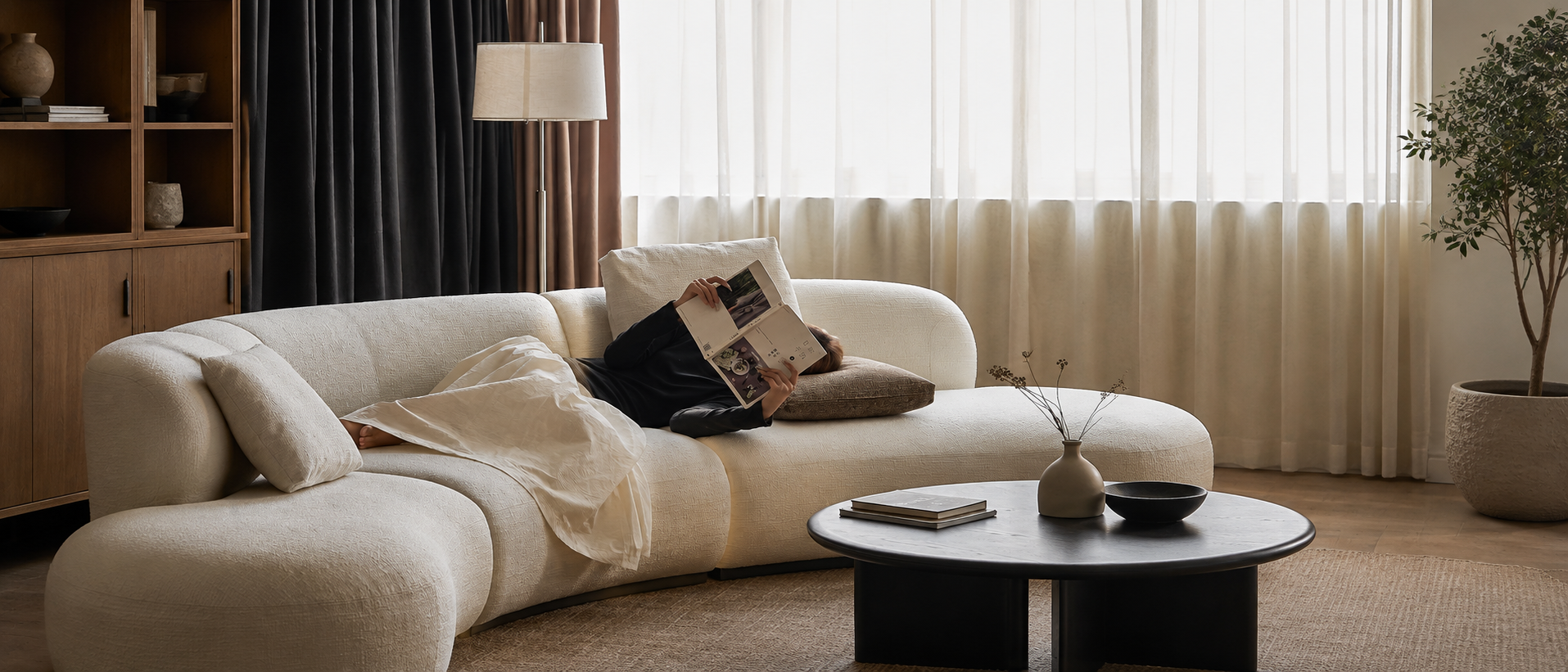 Soft home textiles styled in a warm everyday interior